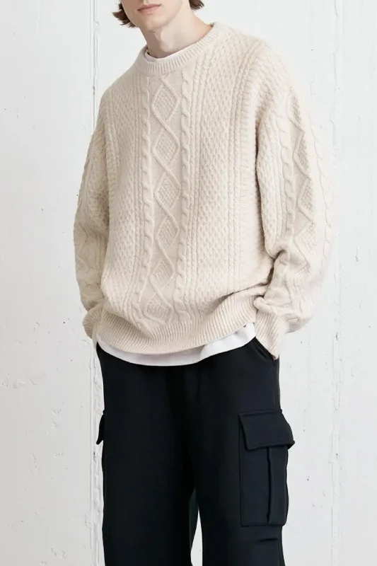 Sporty-chic women’s apparel for active lifestyles   CABLE KNIT CREWNECK SWEATER